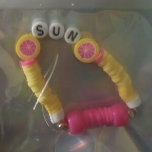 Yellow Beaded Bracelet with Sun Charm